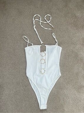 Woman’s White One-Piece bodysuit  with Gold Ring Detail